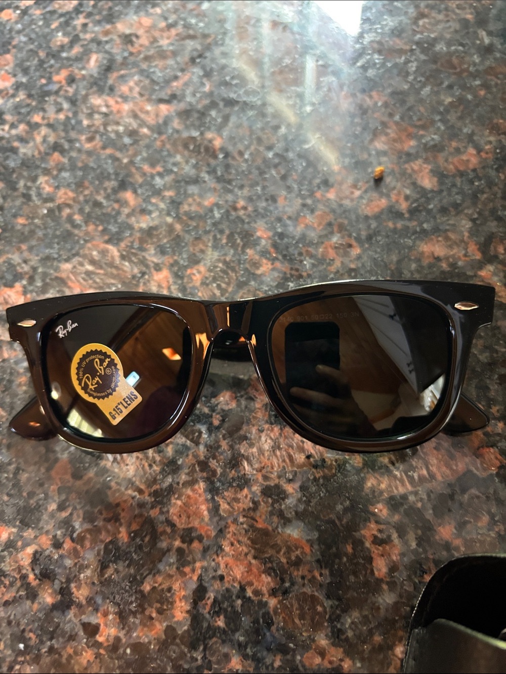 Ray-Ban women’s black Wayfarer Sunglasses with Dark Lenses